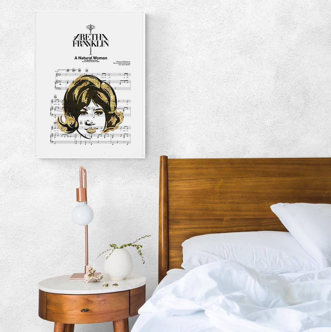 If you need a little bit of soul in your life, look no further than the queen of soul, Aretha Franklin. This beautiful print of her iconic song "Natural Woman" is the perfect way to add some music and art to your walls. The lyrics are printed in a beautiful cursive font, making it the perfect addition to your home décor or as a gift for a music lover.