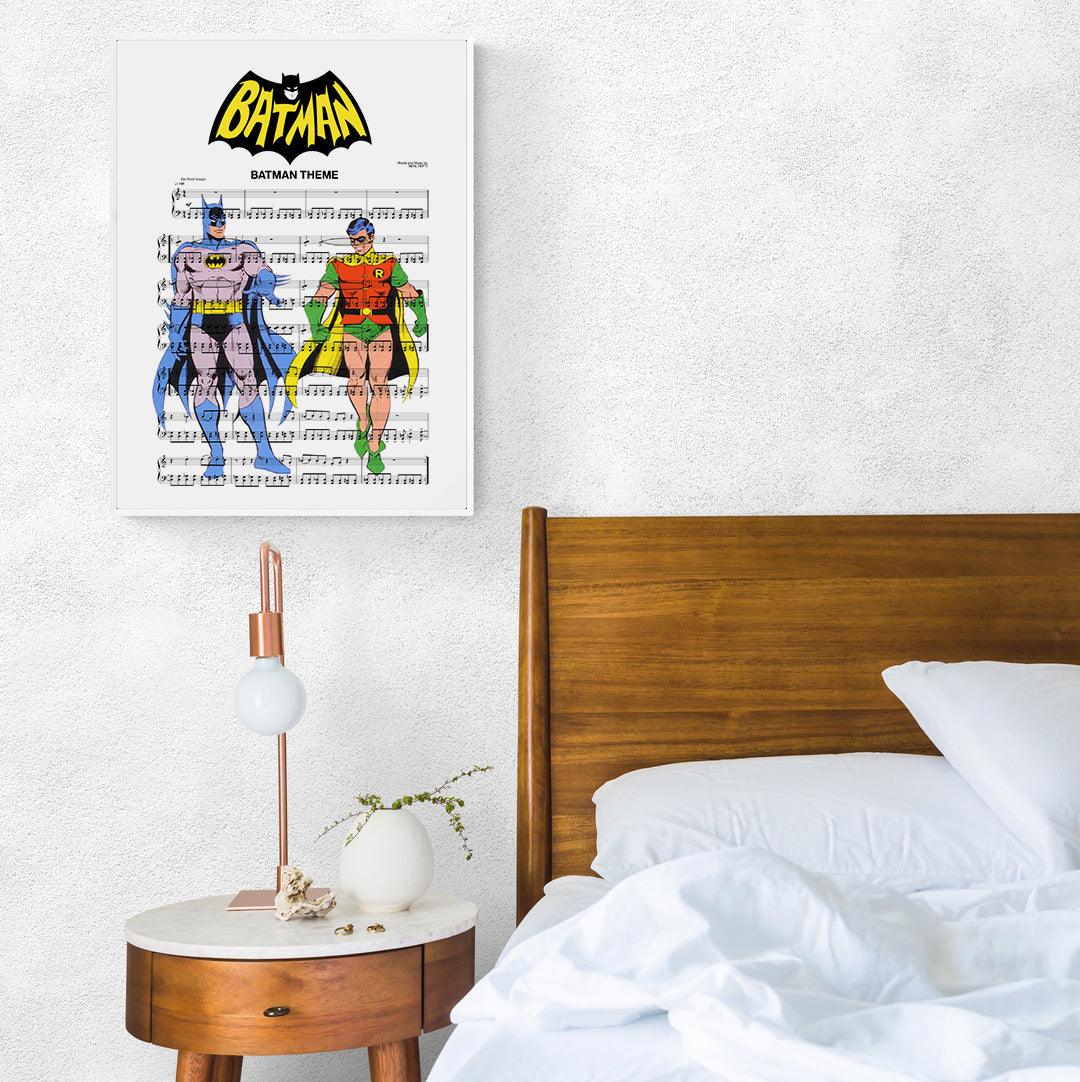 Do you know someone who loves BATMAN and music? This framed poster of the main theme from BATMAN is the perfect gift for them! The lyrics are artfully arranged with the beautiful graphic of the city in the background. The perfect addition to any fan's home décor, this framed poster is a must-have for any music and BATMAN lover.