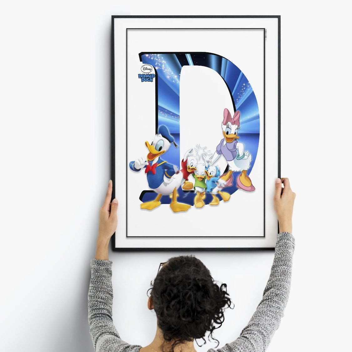 The Donald Duck Movie Poster is the perfect choice for Disney and animation fans. Featuring all of Disney's iconic characters in one place, this classic poster is ideal for any Disney World poster section. These high-quality prints can easily be personalized as wall murals or fine art prints, with the option of print-on-demand available. Enhance any room with this timeless character poster!