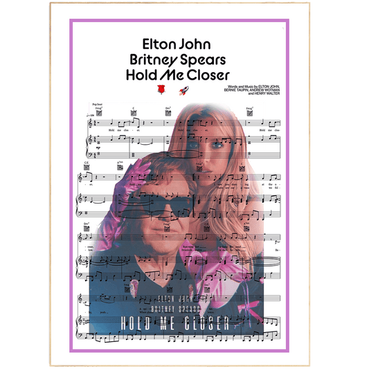 Add some musical flair to your home with this Elton John and Britney Spears - Hold Me Closer Poster. This poster is the perfect way to show off your love of music. Featuring Elton John and Britney Spears, this poster is sure to make a statement in any room. Whether you frame it or hang it as is, this poster is a great way to add a touch of personality to your home.
