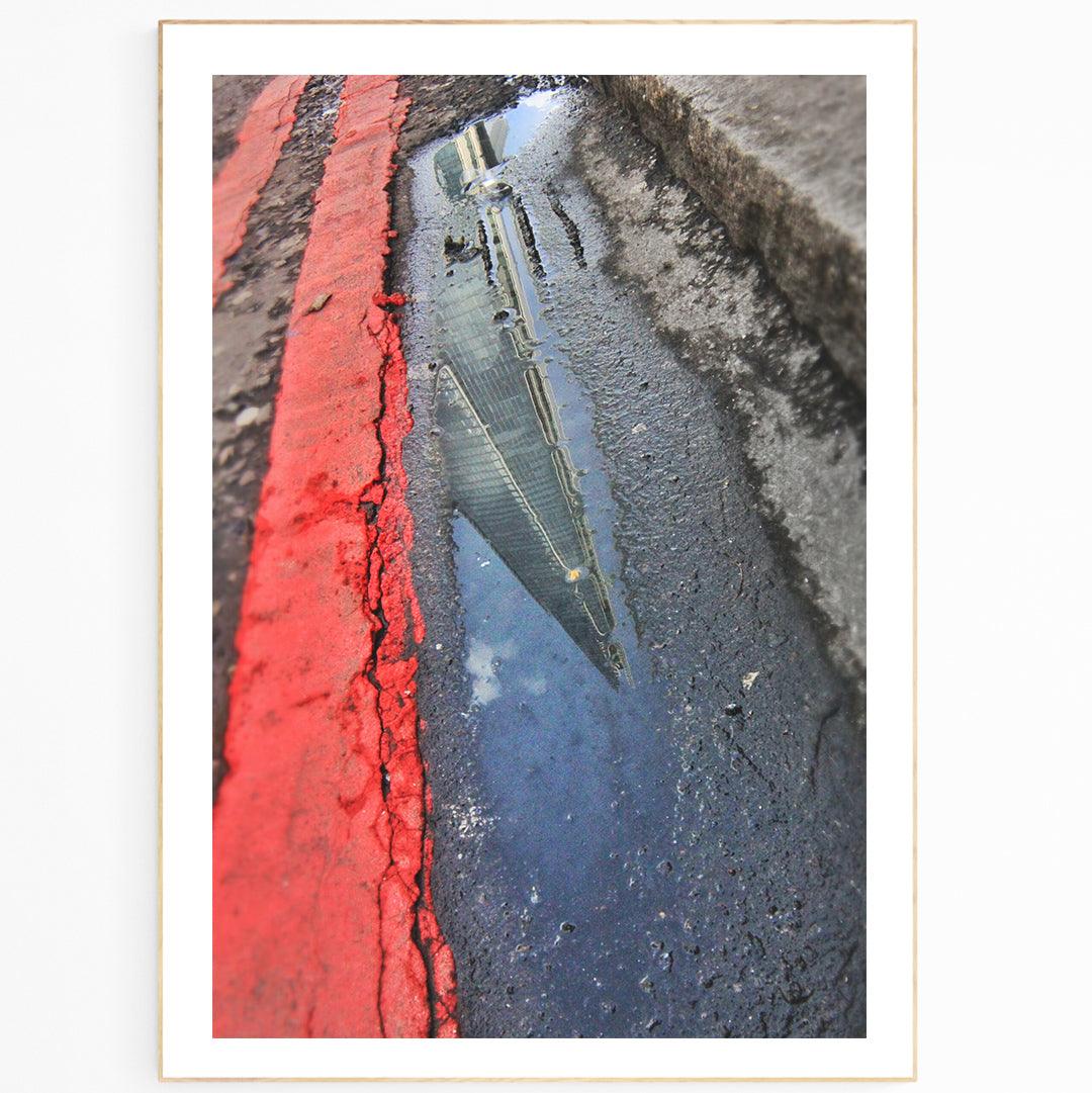 This professional photography captures the iconic Shard Reflection Puddle in London's Financial District. With a crystal-clear image on a magnet or greeting card, this wall art is sure to leave a lasting impression on any viewer. It's a perfect choice for decorating residential, commercial, or public spaces.