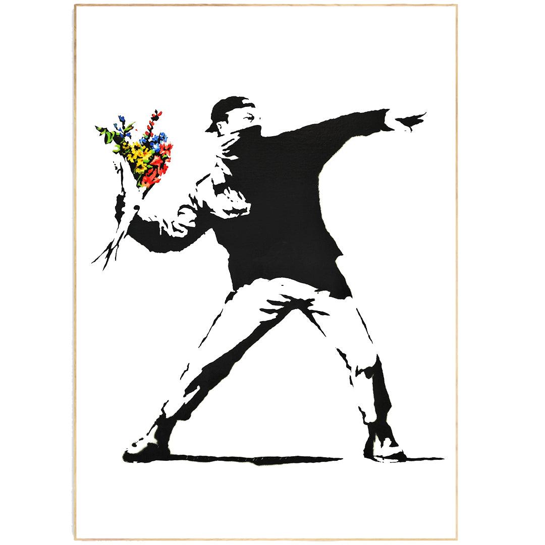This Banksy print features the world-renowned "Rage Flower Thrower" image. Printed on high quality paper, this print is perfect for any art lover or Banksy fan. With its bright colors and powerful message, this print is sure to make a statement in any room.