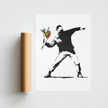 Make a powerful statement in your home with this Banksy print. Depicting a masked figure hurling a bouquet of flowers, this print is a powerful addition to any space. With Banksy's signature style, it's an instant conversation starter. Perfect for fans of street art, this print is a must-have for any collector. Hang it in your home or office and enjoy Banky's unique brand of art.- 98types