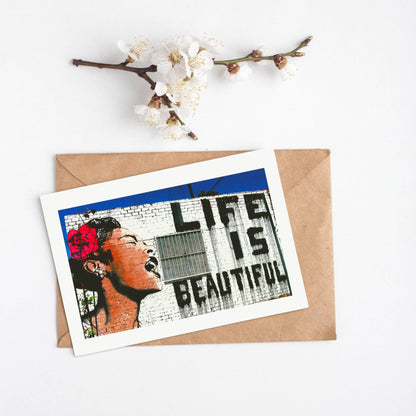 No words needed with this Banksy Life is Beautiful Print. The world-renowned street artist illustrates one of his most iconic works in this piece. The powerful and timely message is brought to life with Banksy's signature stencil style. This print is perfect for anyone who wants to add a little edge to their home decor. It also makes a great gift for the Banksy fan in your life.